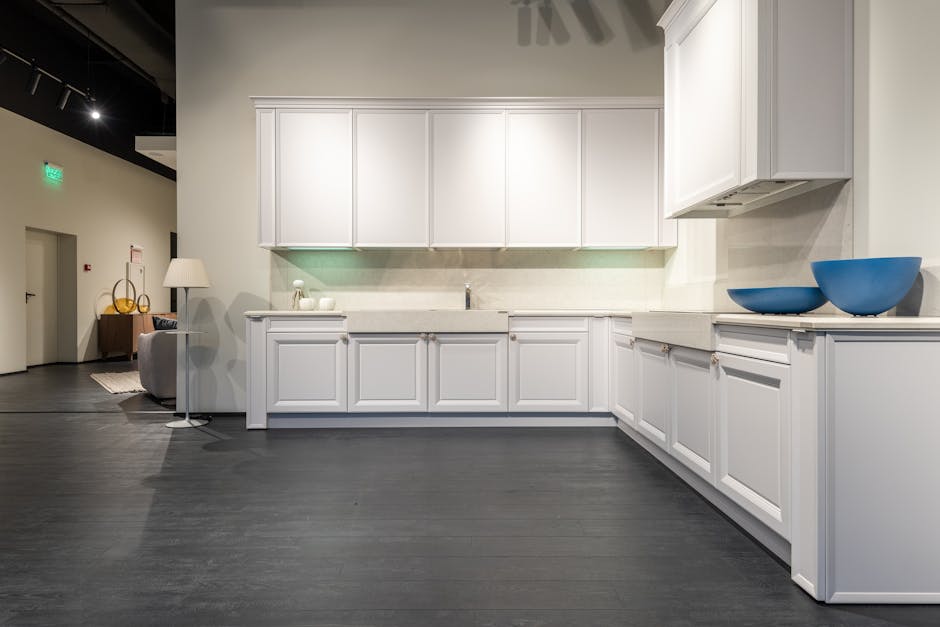 Kitchen cabinet showroom display featuring various wood finishes
